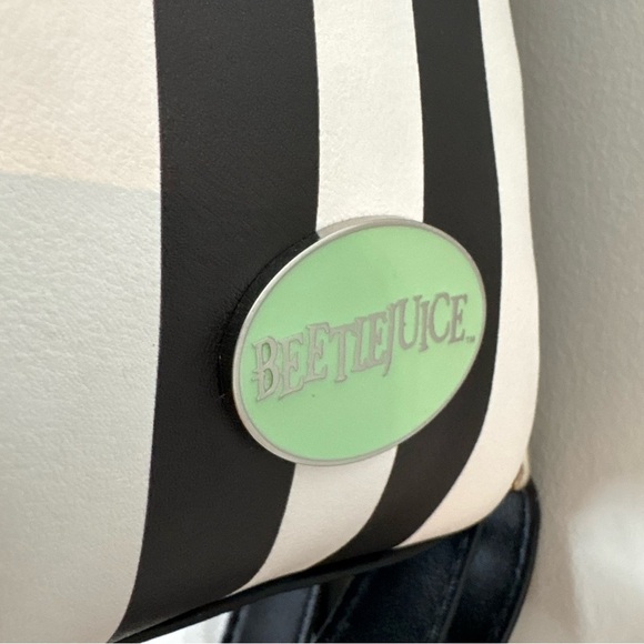 beetlejuice stripes sandworms mini backpack Loungefly Sandworm Crossbody Bag : Clothing, Shoes & Jewelry The vegan leather material makes it water resistant and easy to wipe clean Loungefly Beetlejuice Sandworm Crossbody Bag